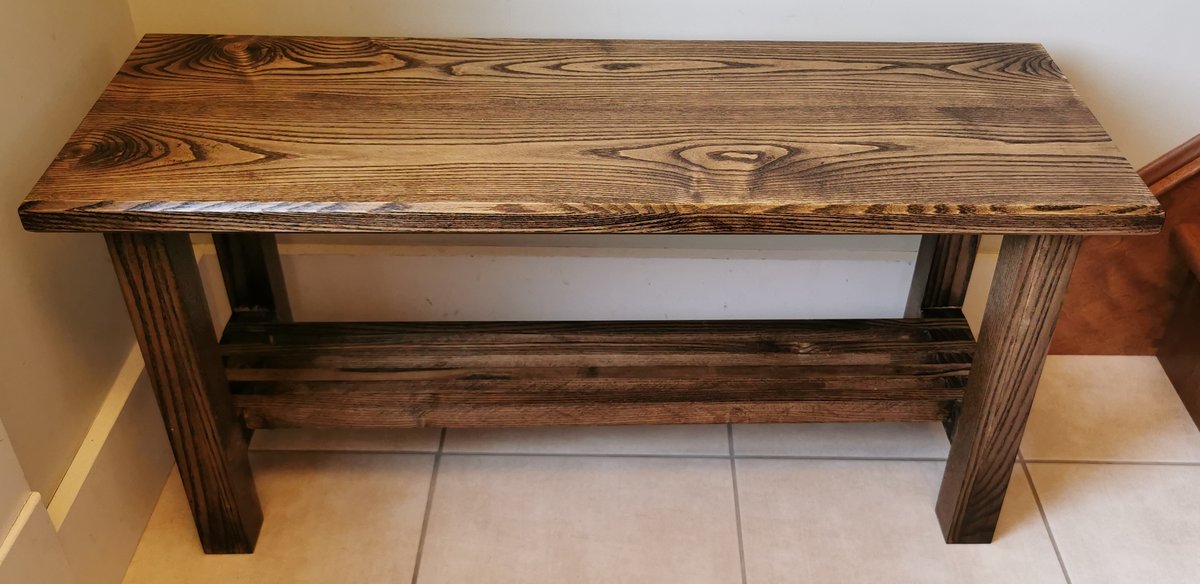 Ash entry bench detail showing grain and finish