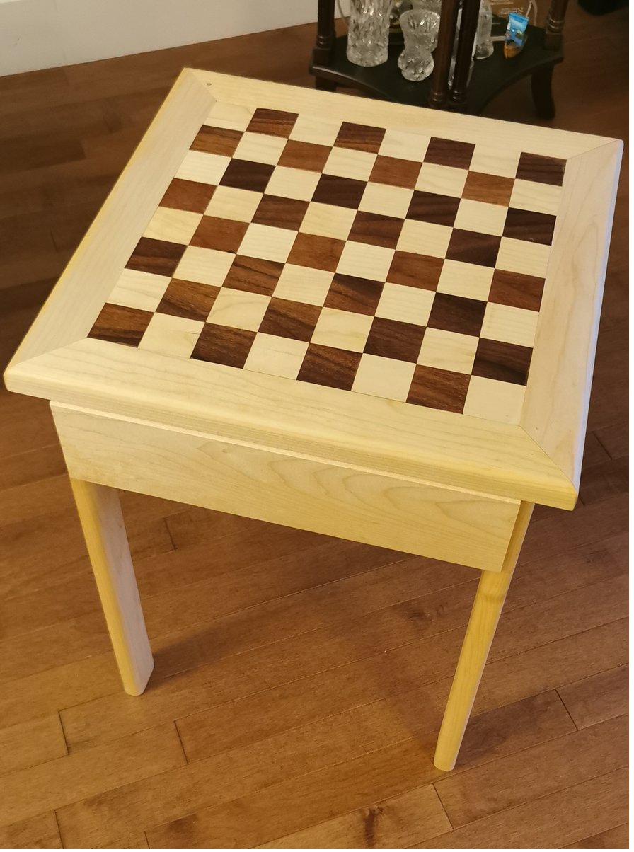 Walnut and maple chess table with hand-cut squares and mortise-and-tenon legs